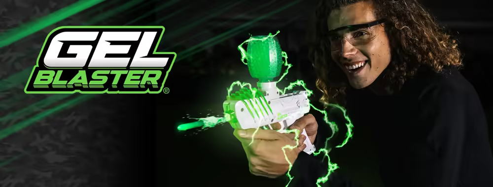 Gel blaster player in full tactical gear aiming during a match
